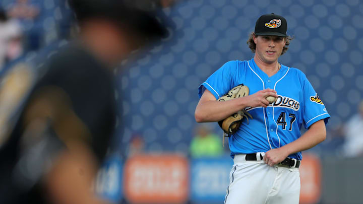 Akron RubberDucks starting pitcher Austin Peterson (47) watches as Erie SeaWolves shortstop Gage Workman (27) rounds the bases after hitting a homer during the first inning of Game 1 of the Eastern League Playoffs at Canal Park, Tuesday, Sept. 17, 2024, in Akron, Ohio.