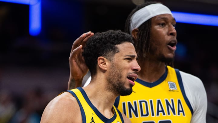 Apr 4, 2025; Indianapolis, Indiana, USA; Indiana Pacers guard Tyrese Haliburton (0) reacts to a basket and foul with center Myles Turner (33) in the second half against the Utah Jazz at Gainbridge Fieldhouse. Mandatory Credit: Trevor Ruszkowski-Imagn Images