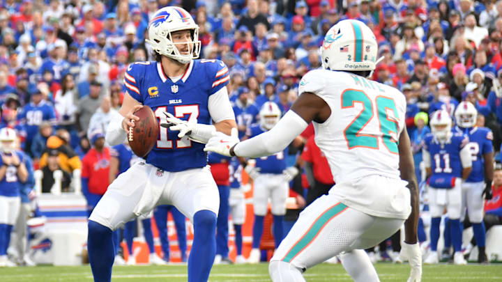 Buffalo Bills quarterback Josh Allen (17) looks to throw a pass as Miami Dolphins safety Marcus Maye (26) gives pressure in the fourth quarter at Highmark Stadium in Week 9. Buffalo Bills quarterback Josh Allen (17) looks to throw a pass as Miami Dolphins safety Marcus Maye (26) gives pressure in the fourth quarter at Highmark Stadium in Week 9.