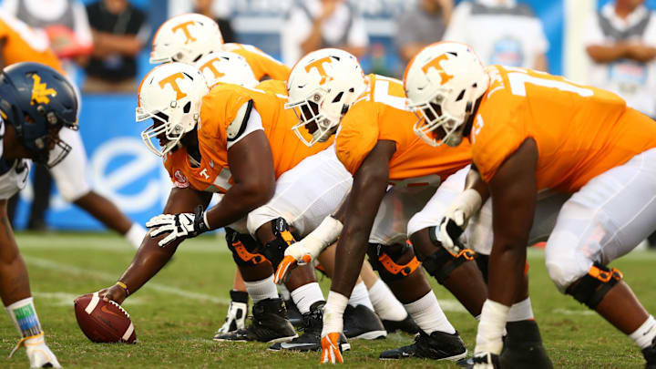 Sep 1, 2018; Charlotte, NC, USA; The Tennessee Volunteers offensive line waits for the snap against the West Virginia Mountaineers at Bank of America Stadium.