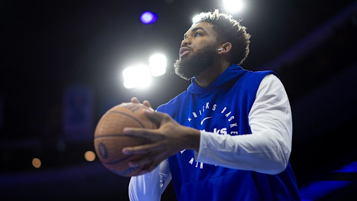 Nov 12, 2024; Philadelphia, Pennsylvania, USA; New York Knicks center Karl-Anthony Towns warms up before action against the Philadelphia 76ers at Wells Fargo Center. Mandatory Credit: Bill Streicher-Imagn Images