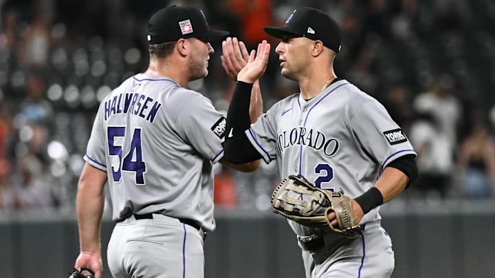 Jul 25, 2025; Baltimore, Maryland, USA;  Colorado Rockies outfielder Tyler Freeman (2) and pitcher Seth Halvorsen (54) celebrate a win against the Baltimore Orioles at Oriole Park at Camden Yards. 