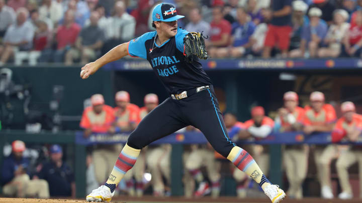 Jul 16, 2024; Arlington, Texas, USA; National League pitcher Paul Skenes of the Pittsburgh Pirates (30) pitches against the American League in the first inning during the 2024 MLB All-Star game at Globe Life Field. Mandatory Credit: Kevin Jairaj-USA TODAY Sports