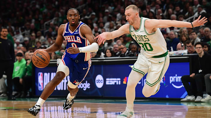 Apr 19, 2026; Boston, Massachusetts, USA; Philadelphia 76ers guard Tyrese Maxey (0) controls the ball while Boston Celtics forward Sam Hauser (30) defends in the first half during game one of the first round of the 2026 NBA Playoffs at TD Garden. Mandatory Credit: Bob DeChiara-Imagn Images