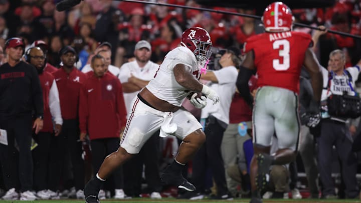Sep 27, 2025; Athens, Georgia, USA; Alabama Crimson Tide offensive lineman Kadyn Proctor (74) runs against the Georgia Bulldogs in the second quarter at Sanford Stadium. Mandatory Credit: Brett Davis-Imagn Images