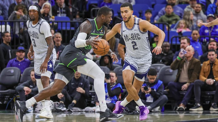 Orlando Magic guard Caleb Houstan defends Minnesota Timberwolves forward Julius Randle during the first quarter at Kia Center in Orlando, Fla., on Jan. 9, 2025. Orlando Magic guard Caleb Houstan defends Minnesota Timberwolves forward Julius Randle during the first quarter at Kia Center in Orlando, Fla., on Jan. 9, 2025.