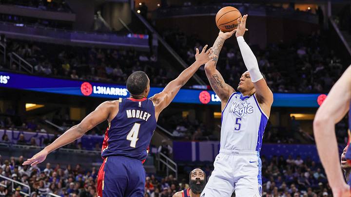Mar 11, 2026; Orlando, Florida, USA; Orlando Magic forward Paolo Banchero (5) shoots over Cleveland Cavaliers center Evan Mobley (4) during the second quarter at Kia Center. Mandatory Credit: Mike Watters-Imagn Images Mar 11, 2026; Orlando, Florida, USA; Orlando Magic forward Paolo Banchero (5) shoots over Cleveland Cavaliers center Evan Mobley (4) during the second quarter at Kia Center. Mandatory Credit: Mike Watters-Imagn Images