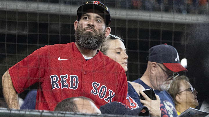 A Boston Red Sox fan reacts as the team struggles to score against the Houston Astros in the seventh inning at Minute Maid Park. 