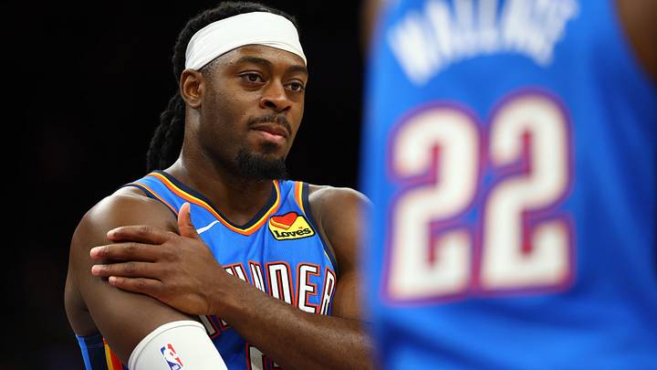 Apr 27, 2026; Phoenix, Arizona, USA; Oklahoma City Thunder guard Luguentz Dort (5) against the Phoenix Suns during game four of the first round of the 2026 NBA Playoffs at Mortgage Matchup Center. Mandatory Credit: Mark J. Rebilas-Imagn Images