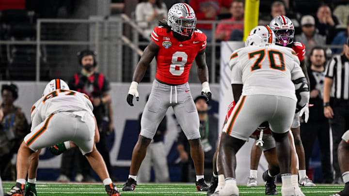 Dec 31, 2025; Arlington, TX, USA; Ohio State Buckeyes linebacker Arvell Reese (8) gets into position during the 2025 Cotton Bowl and quarterfinal game of the College Football Playoff at AT&T Stadium. Mandatory Credit: Jerome Miron-Imagn Images Dec 31, 2025; Arlington, TX, USA; Ohio State Buckeyes linebacker Arvell Reese (8) gets into position during the 2025 Cotton Bowl and quarterfinal game of the College Football Playoff at AT&T Stadium. Mandatory Credit: Jerome Miron-Imagn Images