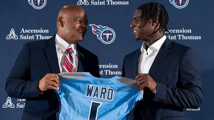 NFL Hall of Fame quarterback Warren Moon, left, poses for pictures with Cam Ward who earlier had been introduced as the Tennessee Titans first-round pick and number one overall pick n the NFL Draft at Ascension Saint Thomas Sports Park in Nashville, Tenn., Friday, April 25, 2025. Moon, whose No. 1 jersey is retired for the Tennessee Titans, allowed Ward to wear his number. Mandatory Credit: The Tennessean/USA TODAY NETWORK via Imagn Images