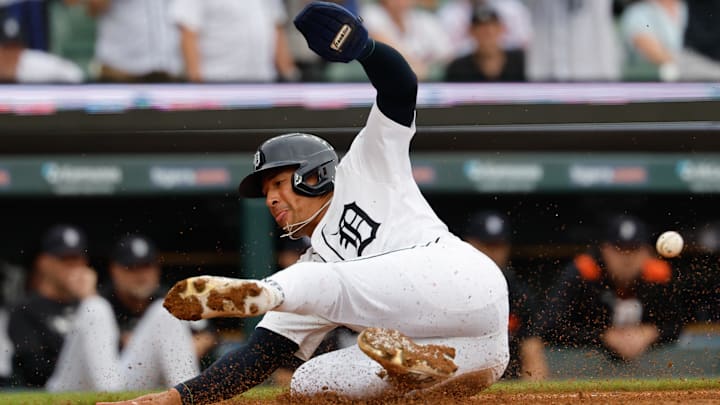Detroit Tigers outfielder Jahmai Jones (18) slides into safe at home in the ninth inning against the Atlanta Braves at Comerica Park. Detroit Tigers outfielder Jahmai Jones (18) slides into safe at home in the ninth inning against the Atlanta Braves at Comerica Park.