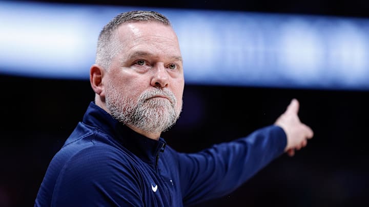 Apr 1, 2025; Denver, Colorado, USA; Denver Nuggets head coach Michael Malone in the second quarter against the Minnesota Timberwolves at Ball Arena. Mandatory Credit: Isaiah J. Downing-Imagn Images