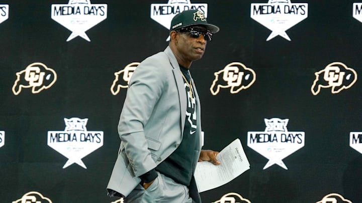 Jul 9, 2025; Frisco, TX, USA; Colorado head coach Deion Sanders walks onto the stage during 2025 Big 12 Football Media Days at The Star. 