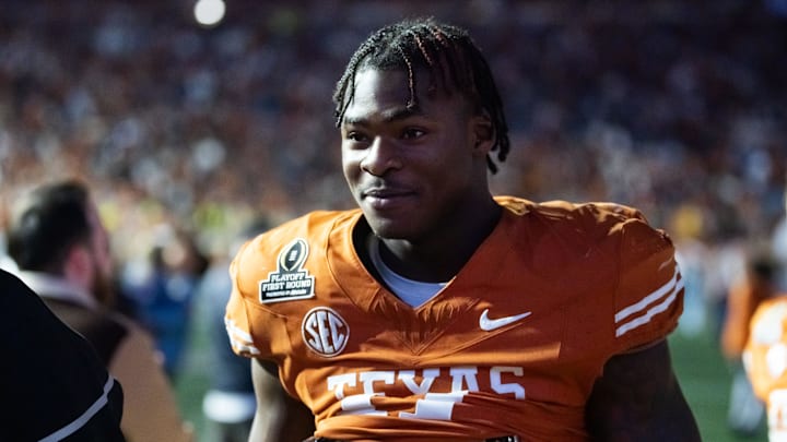 Dec 21, 2024; Austin, Texas, USA; Texas Longhorns linebacker Colin Simmons (11) against the Clemson Tigers during the CFP National playoff first round at Darrell K Royal-Texas Memorial Stadium. Mandatory Credit: Mark J. Rebilas-Imagn Images
