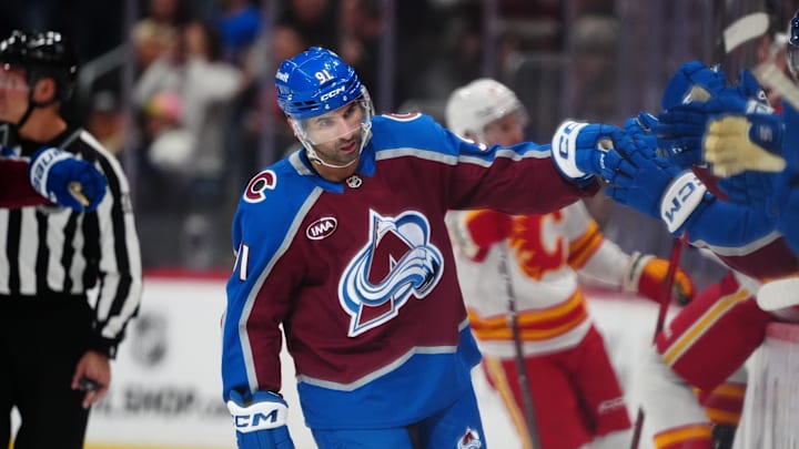 Mar 30, 2026; Denver, Colorado, USA; Colorado Avalanche center Nazem Kadri (91) celebrates his first goal of the first period against the Calgary Flames at Ball Arena. Mandatory Credit: Ron Chenoy-Imagn Images