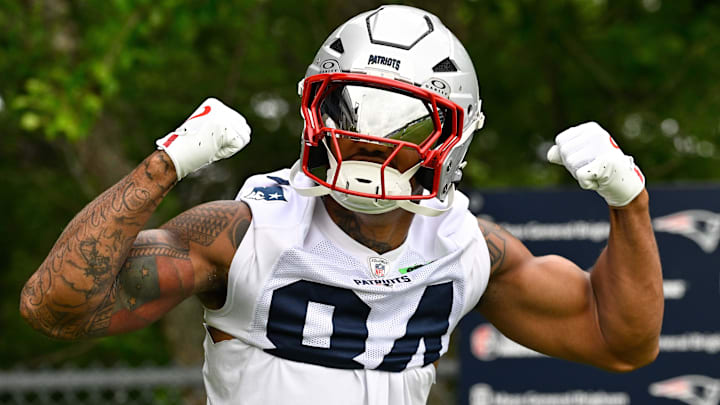 Jun 9, 2025; Foxborough, MA, USA; New England Patriots wide receiver Kendrick Bourne (84) flexes on his way to the practice fields at Gillette Stadium. Mandatory Credit: Eric Canha-Imagn Images