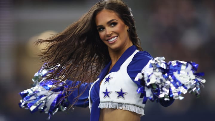 Dallas Cowboys cheerleader performs during a timeout in the game against the Los Angeles Chargers at AT&T Stadium.