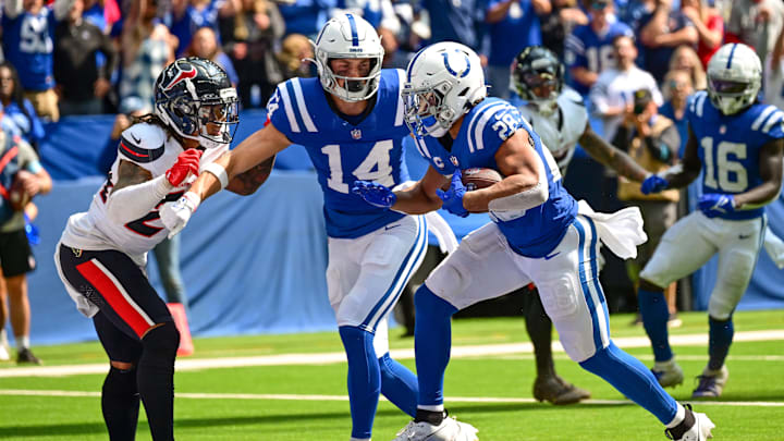 Indianapolis Colts running back Jonathan Taylor (28) runs the ball into the end zone for a touchdown during the second half against the Houston Texans at Lucas Oil Stadium. Indianapolis Colts running back Jonathan Taylor (28) runs the ball into the end zone for a touchdown during the second half against the Houston Texans at Lucas Oil Stadium.