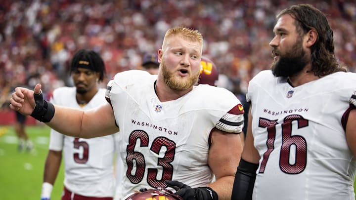 Sep 29, 2024; Glendale, Arizona, USA; Washington Commanders center Tyler Biadasz (63) with guard Sam Cosmi (76) against the Arizona Cardinals at State Farm Stadium. Mandatory Credit: Mark J. Rebilas-Imagn Images Sep 29, 2024; Glendale, Arizona, USA; Washington Commanders center Tyler Biadasz (63) with guard Sam Cosmi (76) against the Arizona Cardinals at State Farm Stadium. Mandatory Credit: Mark J. Rebilas-Imagn Images