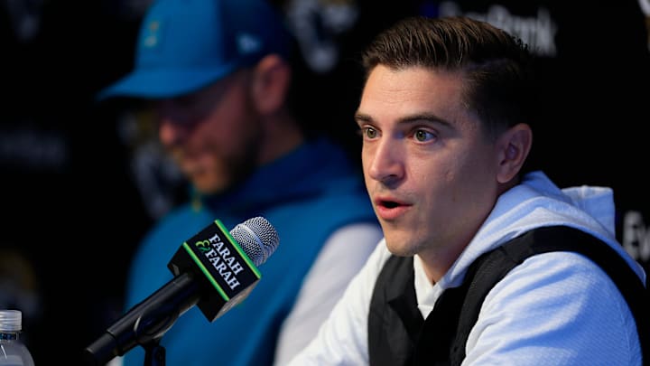 Jacksonville Jaguars general manager James Gladstone speaks during a press conference next to head coach Liam Coen at the Miller Electric Center, Wednesday, Jan. 14, 2026, in Jacksonville, Fla.