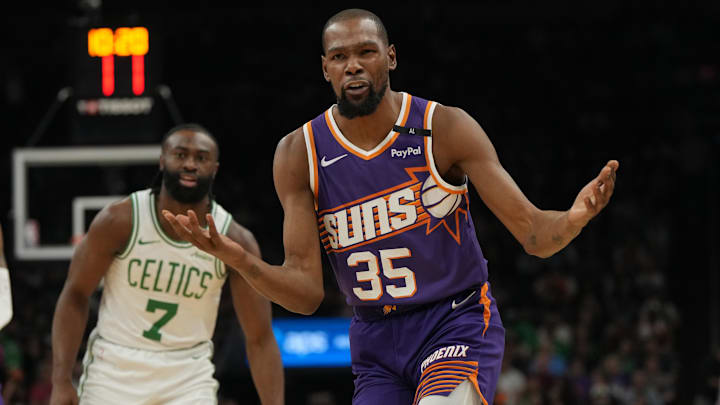 Mar 26, 2025; Phoenix, Arizona, USA; Phoenix Suns forward Kevin Durant (35) reacts after a foul call against the Boston Celtics during the first half at Footprint Center. Mandatory Credit: Rick Scuteri-Imagn Images