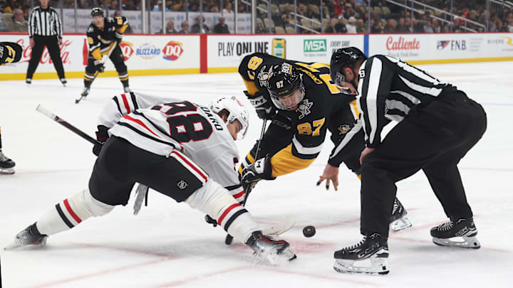 Apr 8, 2025; Pittsburgh, Pennsylvania, USA; Chicago Blackhawks center Connor Bedard (98) and Pittsburgh Penguins center Sidney Crosby (87) take a third period face-off at PPG Paints Arena. Mandatory Credit: Charles LeClaire-Imagn Images Apr 8, 2025; Pittsburgh, Pennsylvania, USA; Chicago Blackhawks center Connor Bedard (98) and Pittsburgh Penguins center Sidney Crosby (87) take a third period face-off at PPG Paints Arena. Mandatory Credit: Charles LeClaire-Imagn Images