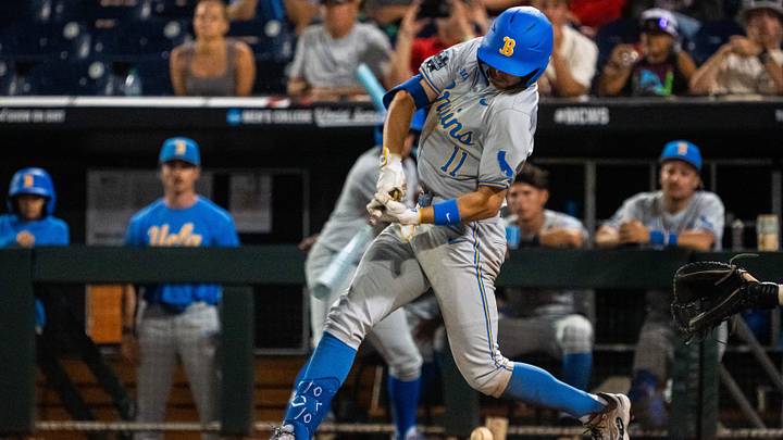 UCLA Bruins center fielder Payton Brennan hits an RBI single against the Arkansas Razorbacks during the 2025 Men's College World Series. UCLA Bruins center fielder Payton Brennan hits an RBI single against the Arkansas Razorbacks during the 2025 Men's College World Series.