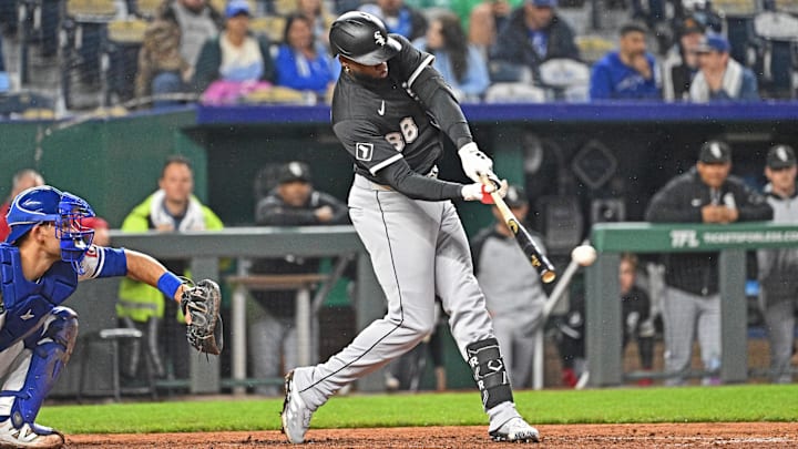 Chicago White Sox center fielder Luis Robert Jr. (88) singles against the Kansas City Royals at Kauffman Stadium. 