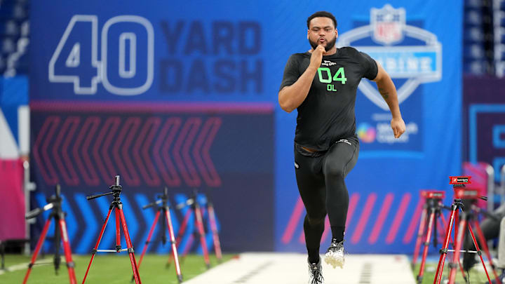 Mar 2, 2025; Indianapolis, IN, USA; Kansas offensive lineman Logan Brown (OL04) during the 2025 NFL Scouting Combine at Lucas Oil Stadium. Mandatory Credit: Kirby Lee-Imagn Images