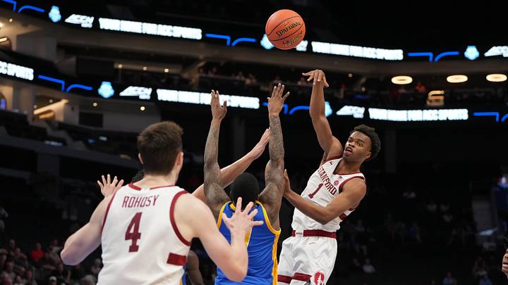 Mar 10, 2026; Charlotte, NC, USA; Stanford Cardinal guard Ebuka Okorie (1) passes the ball to forward AJ Rohosy (4) as Pittsburgh Panthers guard Damarco Minor (7) defends in the second half at Spectrum Center. Mandatory Credit: Bob Donnan-Imagn Images Mar 10, 2026; Charlotte, NC, USA; Stanford Cardinal guard Ebuka Okorie (1) passes the ball to forward AJ Rohosy (4) as Pittsburgh Panthers guard Damarco Minor (7) defends in the second half at Spectrum Center. Mandatory Credit: Bob Donnan-Imagn Images