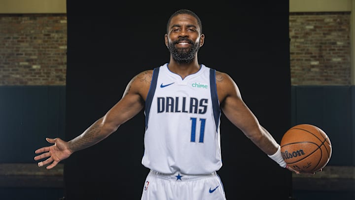 Dallas Mavericks guard Kyrie Irving (11) poses for a photo during the Mavericks 2025 media day at the American Airlines Center. 