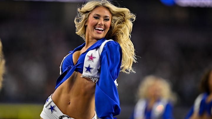 The Dallas Cowboys cheerleaders perform during the game between the Dallas Cowboys and the Green Bay Packers The Dallas Cowboys cheerleaders perform during the game between the Dallas Cowboys and the Green Bay Packers