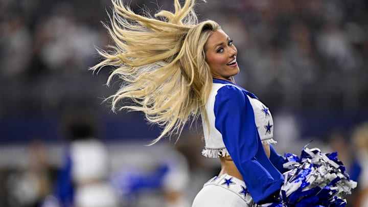 The Dallas Cowboys cheerleaders perform during the game against the Arizona Cardinals at AT&T Stadium. The Dallas Cowboys cheerleaders perform during the game against the Arizona Cardinals at AT&T Stadium.