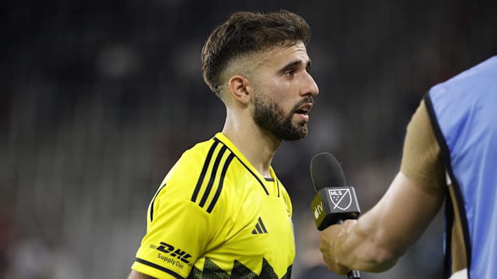 Mar 29, 2025; Washington, District of Columbia, USA; Columbus Crew forward Diego Rossi (10) speaks to the media after defeating D.C. United at Audi Field. Mandatory Credit: Amber Searls-Imagn Images