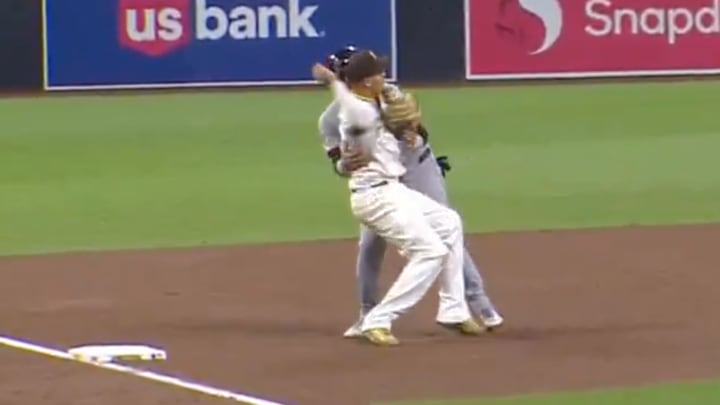 Gabriel Arias gets up close and personal with Manny Machado. Gabriel Arias gets up close and personal with Manny Machado.