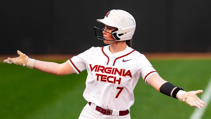 Nora Abromavage flares her arms as she rounds third at Tech Softball Park.