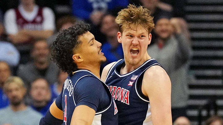 Mar 27, 2025; Newark, NJ, USA; Arizona Wildcats forward Henri Veesaar (13) celebrates with Arizona Wildcats forward Trey Townsend (4) after a play against the Duke Blue Devils during the second half during an East Regional semifinal of the 2025 NCAA tournament at Prudential Center. Mar 27, 2025; Newark, NJ, USA; Arizona Wildcats forward Henri Veesaar (13) celebrates with Arizona Wildcats forward Trey Townsend (4) after a play against the Duke Blue Devils during the second half during an East Regional semifinal of the 2025 NCAA tournament at Prudential Center.