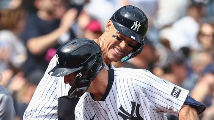 Mar 29, 2025; Bronx, New York, USA; New York Yankees first baseman Paul Goldschmidt (48) is greeted by right fielder Aaron Judge (99) after hitting a solo home run in the first inning against the Milwaukee Brewers at Yankee Stadium. Mandatory Credit: Wendell Cruz-Imagn Images