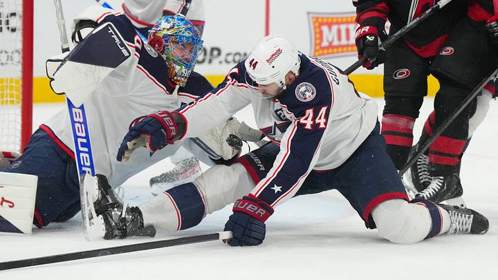 Apr 2, 2026; Raleigh, North Carolina, USA; Columbus Blue Jackets defenseman Erik Gudbranson (44) blocks the shot in front of goaltender Elvis Merzlikins (90) against the Carolina Hurricanes during the second period at Lenovo Center. Mandatory Credit: James Guillory-Imagn Images Apr 2, 2026; Raleigh, North Carolina, USA; Columbus Blue Jackets defenseman Erik Gudbranson (44) blocks the shot in front of goaltender Elvis Merzlikins (90) against the Carolina Hurricanes during the second period at Lenovo Center. Mandatory Credit: James Guillory-Imagn Images
