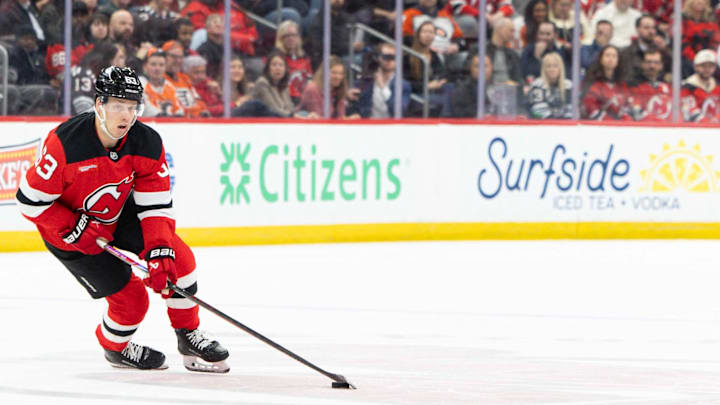 New Jersey Devils left wing Jesper Bratt (63) skates with the puck against the Philadelphia Flyers during the third period at Prudential Center. Mandatory Credit: Luther Schlaifer-Imagn Images