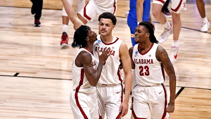 Mar 28, 2021; Indianapolis, Indiana, USA; Alabama Crimson Tide forward Alex Reese (3) reacts after making the game tying basket against the UCLA Bruins during the second half in the Sweet Sixteen of the 2021 NCAA Tournament at Hinkle Fieldhouse. Mandatory Credit: Doug McSchooler-Imagn Images Mar 28, 2021; Indianapolis, Indiana, USA; Alabama Crimson Tide forward Alex Reese (3) reacts after making the game tying basket against the UCLA Bruins during the second half in the Sweet Sixteen of the 2021 NCAA Tournament at Hinkle Fieldhouse. Mandatory Credit: Doug McSchooler-Imagn Images