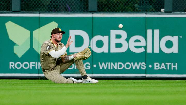 Sep 14, 2026; Denver, Colorado, USA; San Diego Padres center fielder Jackson Merrill (3) makes a sliding catch in the third inning against the Colorado Rockies at Coors Field. Mandatory Credit: Isaiah J. Downing-Imagn Images Sep 14, 2026; Denver, Colorado, USA; San Diego Padres center fielder Jackson Merrill (3) makes a sliding catch in the third inning against the Colorado Rockies at Coors Field. Mandatory Credit: Isaiah J. Downing-Imagn Images