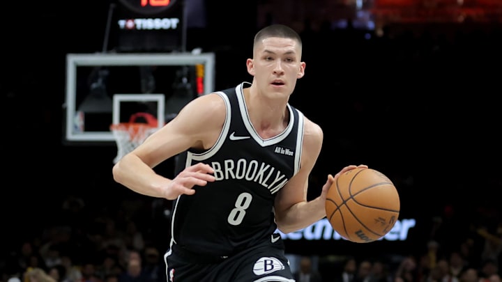 Dec 29, 2025; Brooklyn, New York, USA; Brooklyn Nets guard Egor Demin (8) controls the ball against the Golden State Warriors during the third quarter at Barclays Center. Mandatory Credit: Brad Penner-Imagn Images