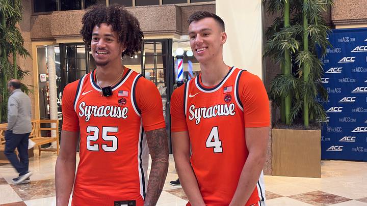 Syracuse Orange players Aiden Tobiason (left) and Gavin Doty joke around in the lobby of the Uptown Hilton hotel Wednesday, prior to meeting the media at ACC Tipoff. Syracuse Orange players Aiden Tobiason (left) and Gavin Doty joke around in the lobby of the Uptown Hilton hotel Wednesday, prior to meeting the media at ACC Tipoff.