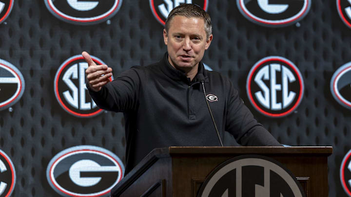 Oct 15, 2024; Birmingham, AL, USA; Georgia Bulldogs head coach Mike White talks with the media during SEC Media Days at Grand Bohemian Hotel. Mandatory Credit: Vasha Hunt-Imagn Images