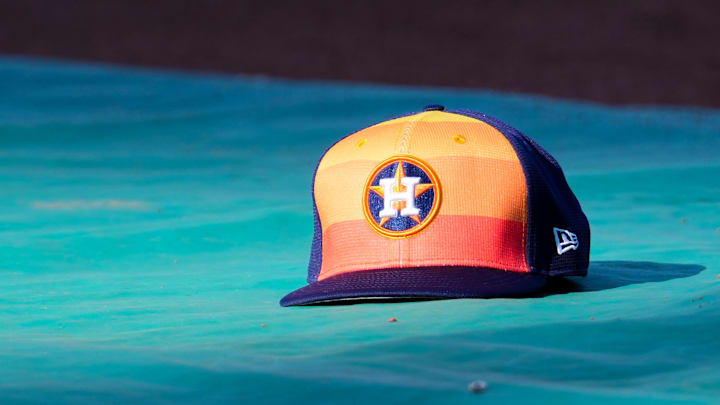 Apr 9, 2024; Kansas City, Missouri, USA; A general view of Houston Astros second base Jose Altuve (27) hat on the field during batting practice prior to a game against the Kansas City Royals at Kauffman Stadium. Mandatory Credit: Denny Medley-Imagn Images