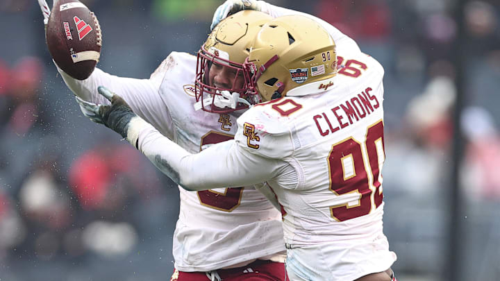 Dec 28, 2024; Bronx, NY, USA; Boston College Eagles defensive lineman Josiah Griffin (9) celebrates with defensive lineman Ty Clemons (90) after a fumble recovery during the first half against the Nebraska Cornhuskers at Yankee Stadium. Mandatory Credit: Vincent Carchietta-Imagn Images Dec 28, 2024; Bronx, NY, USA; Boston College Eagles defensive lineman Josiah Griffin (9) celebrates with defensive lineman Ty Clemons (90) after a fumble recovery during the first half against the Nebraska Cornhuskers at Yankee Stadium. Mandatory Credit: Vincent Carchietta-Imagn Images