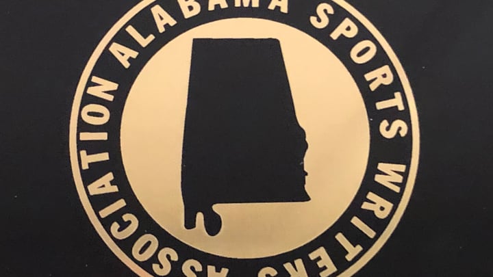 Alabama Sports Writers Association logo, gold on black