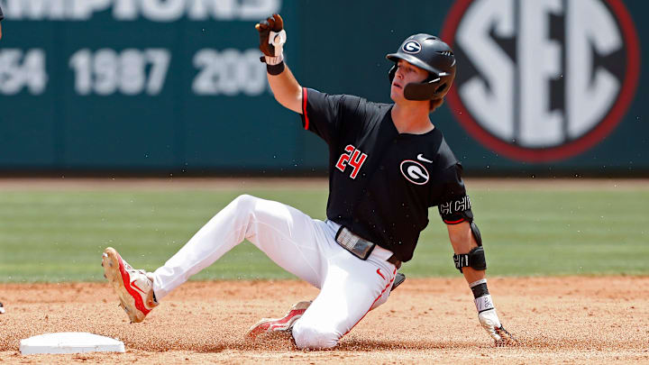 Georgia's Charlie Condon (24) slides into second base during a NCAA Athens Regional baseball game against Army in Athens, Ga., on Friday, May 31, 2024. Georgia won 8-7. Georgia's Charlie Condon (24) slides into second base during a NCAA Athens Regional baseball game against Army in Athens, Ga., on Friday, May 31, 2024. Georgia won 8-7.